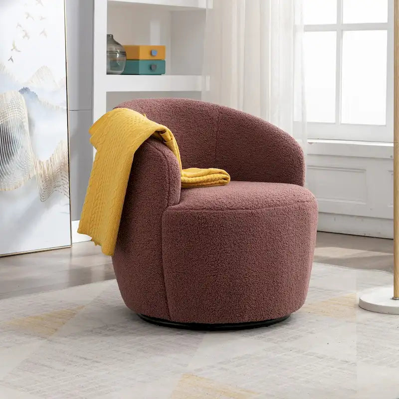 Fauteuil pivotant d'appoint en tissu Teddy, fauteuil club rembourré avec piètement pivotant rond en métal noir.