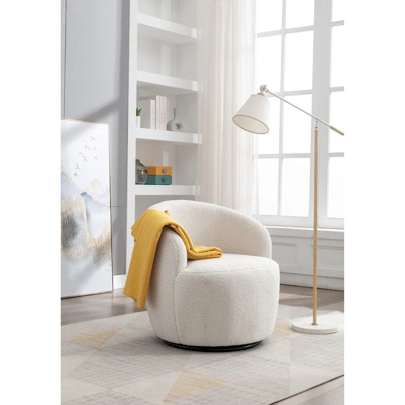 Fauteuil pivotant d'appoint en tissu Teddy, fauteuil club rembourré avec piètement pivotant rond en métal noir.