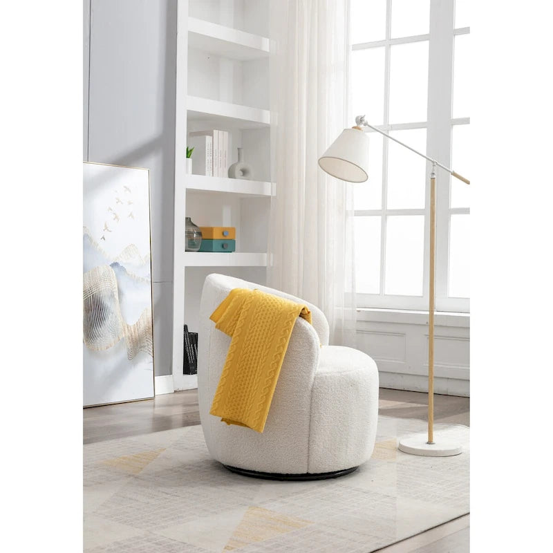 Fauteuil pivotant d'appoint en tissu Teddy, fauteuil club rembourré avec piètement pivotant rond en métal noir.