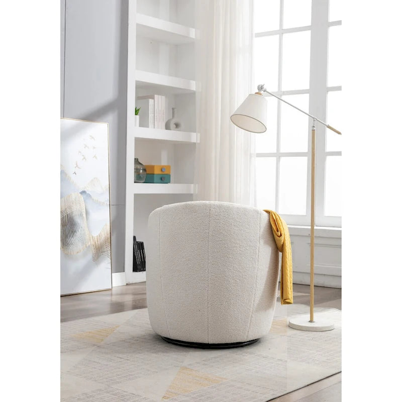 Fauteuil pivotant d'appoint en tissu Teddy, fauteuil club rembourré avec piètement pivotant rond en métal noir.