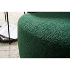 Fauteuil pivotant d'appoint en tissu Teddy, fauteuil club rembourré avec piètement pivotant rond en métal noir.