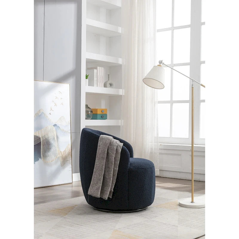 Fauteuil pivotant d'appoint en tissu Teddy, fauteuil club rembourré avec piètement pivotant rond en métal noir.