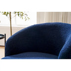 Fauteuil pivotant d'appoint en tissu Teddy, fauteuil club rembourré avec piètement pivotant rond en métal noir.